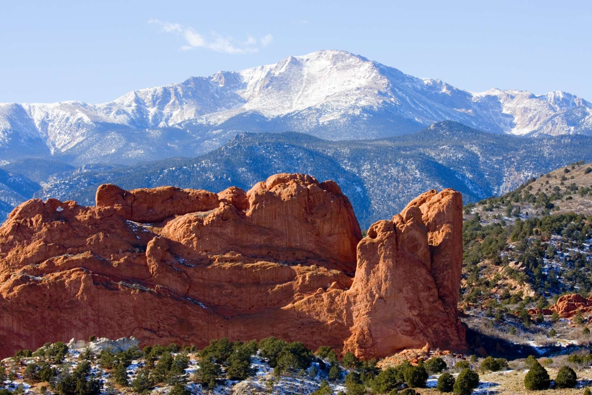 Garden of the Gods red rock formations below snow-covered Pikes Peak in Colorado Springs